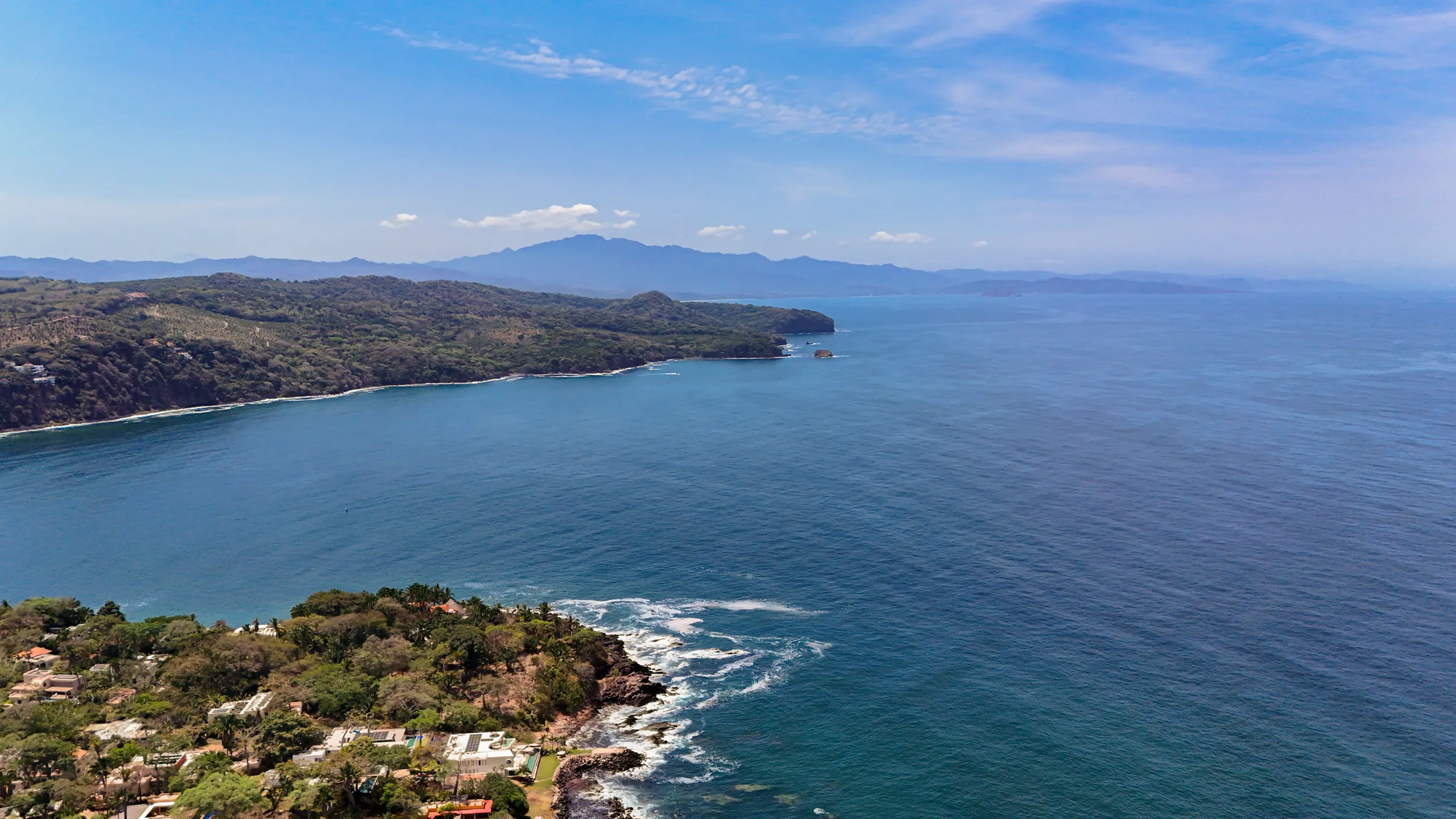 Expansive coastal views across Riviera Nayarit, where tropical landscape meets the Pacific Ocean in a remarkably private setting.
