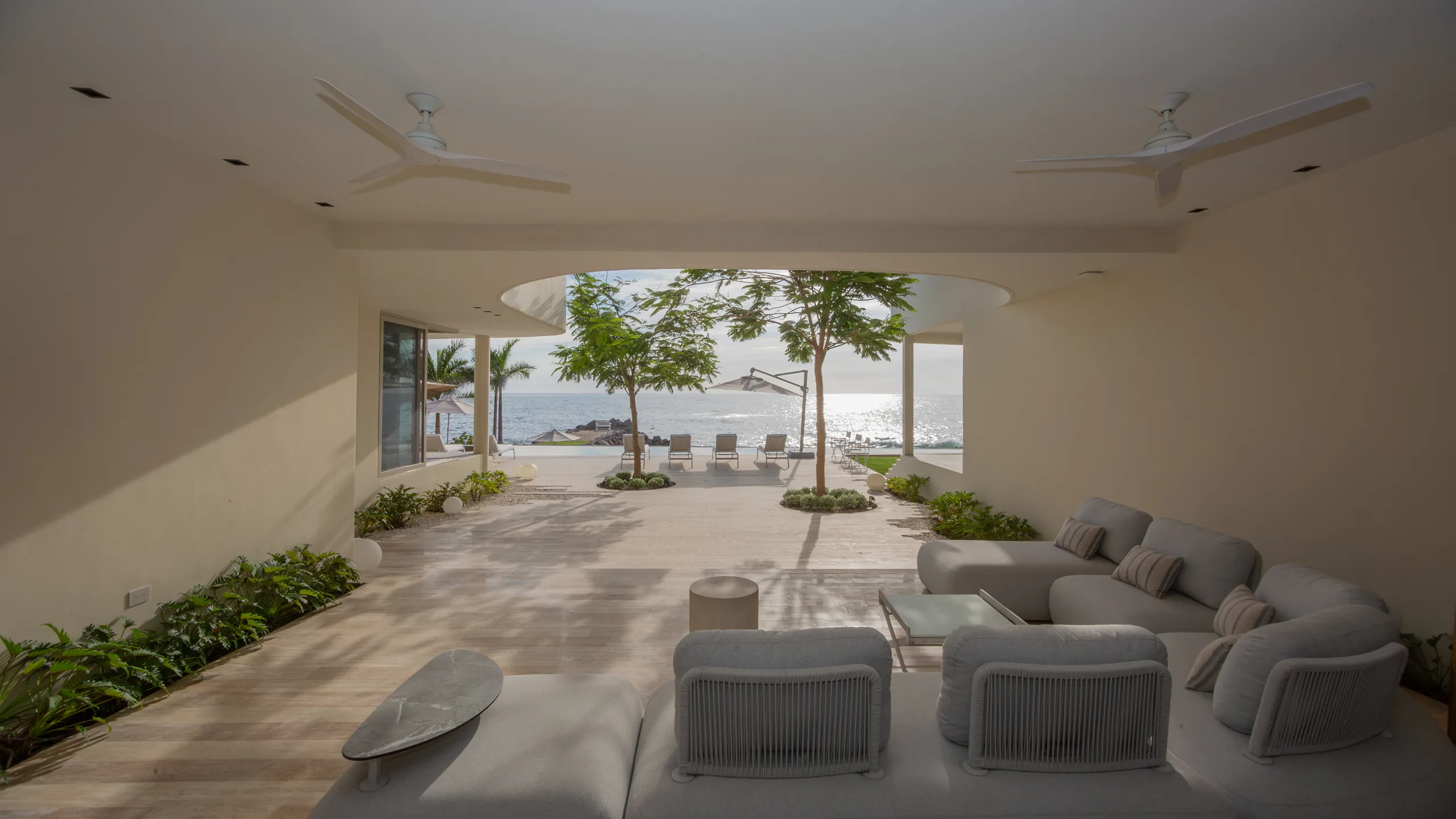 Open-concept living spaces designed to connect seamlessly with the terrace, ocean views, and surrounding natural landscape.